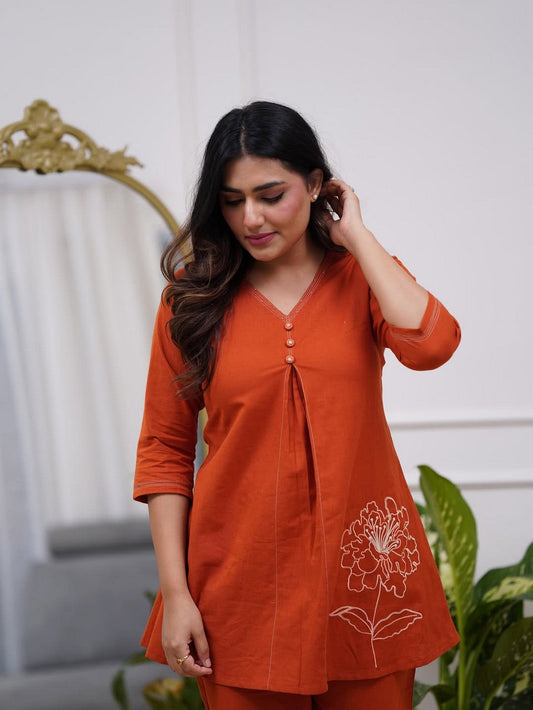 Women’s Rust Orange A-Line Kurti Set – V-Neck Short Kurta with Floral Embroidery & Matching Pants Akrish