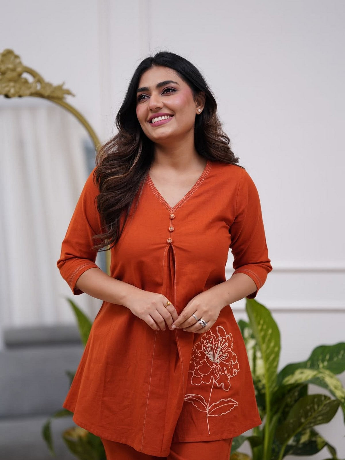 Women’s Rust Orange A-Line Kurti Set – V-Neck Short Kurta with Floral Embroidery & Matching Pants Akrish